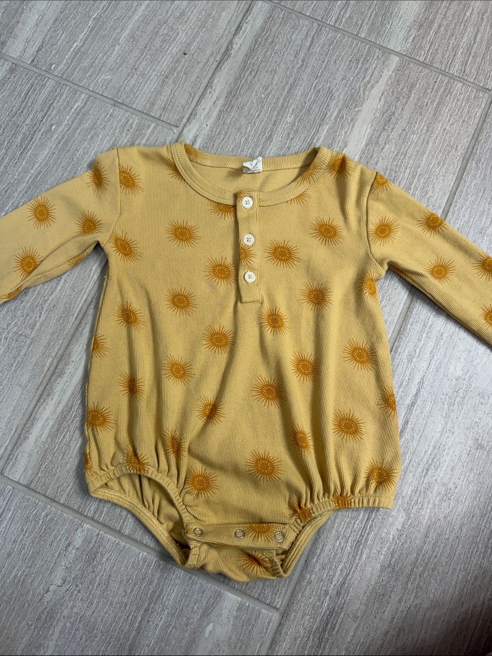 Kate Quinn sun long sleeve onesie